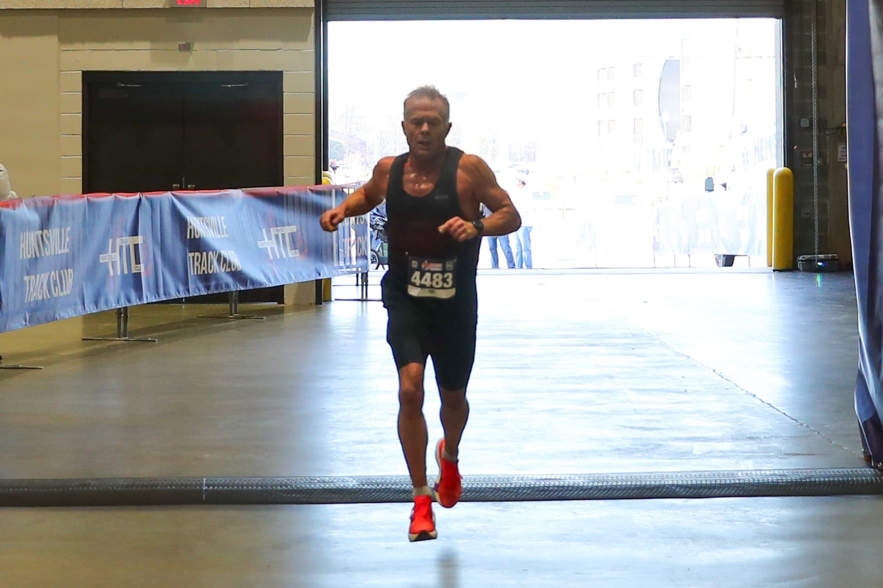 Runner finishing a race.